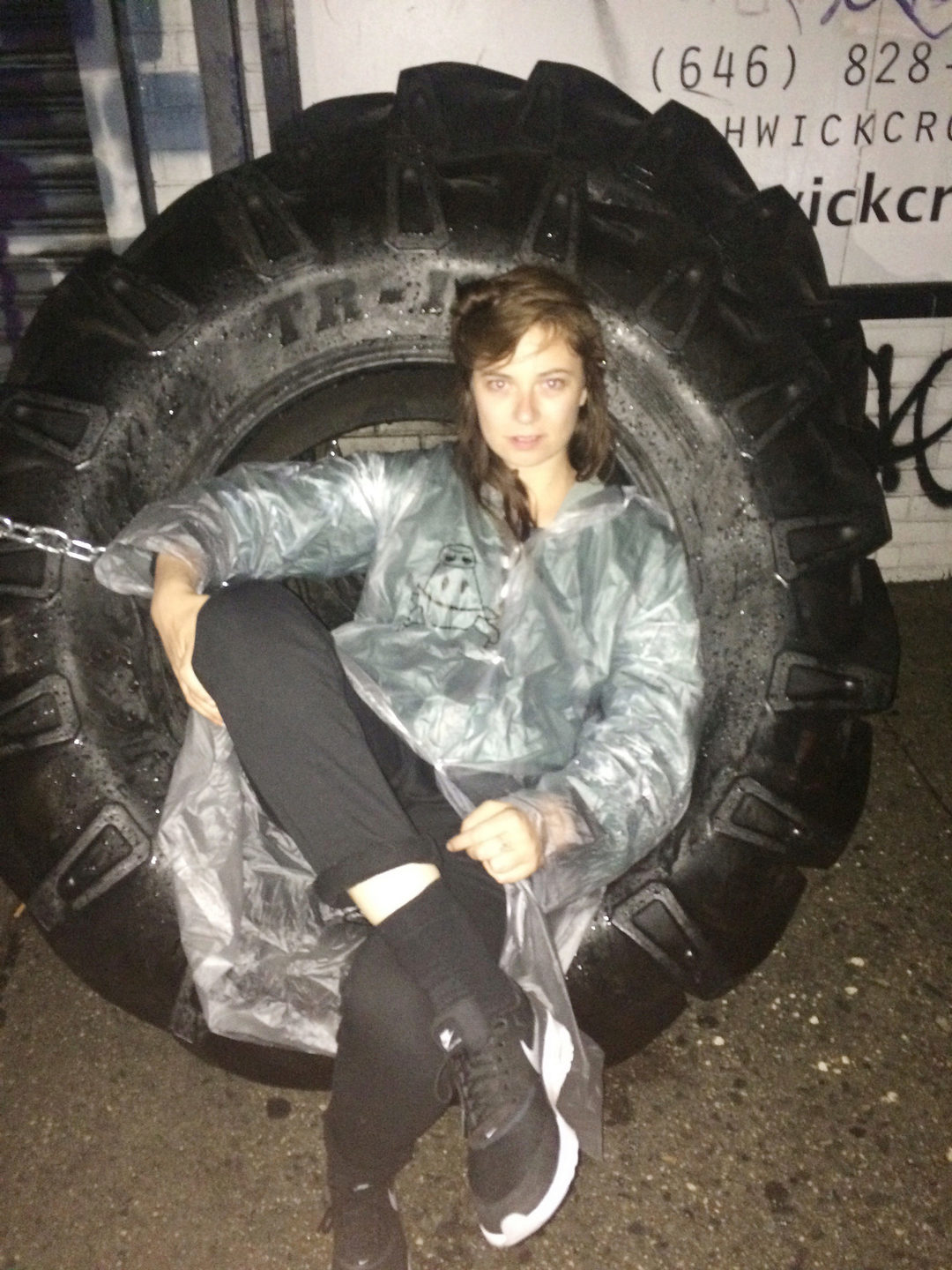 S and the raincoat in a wheel